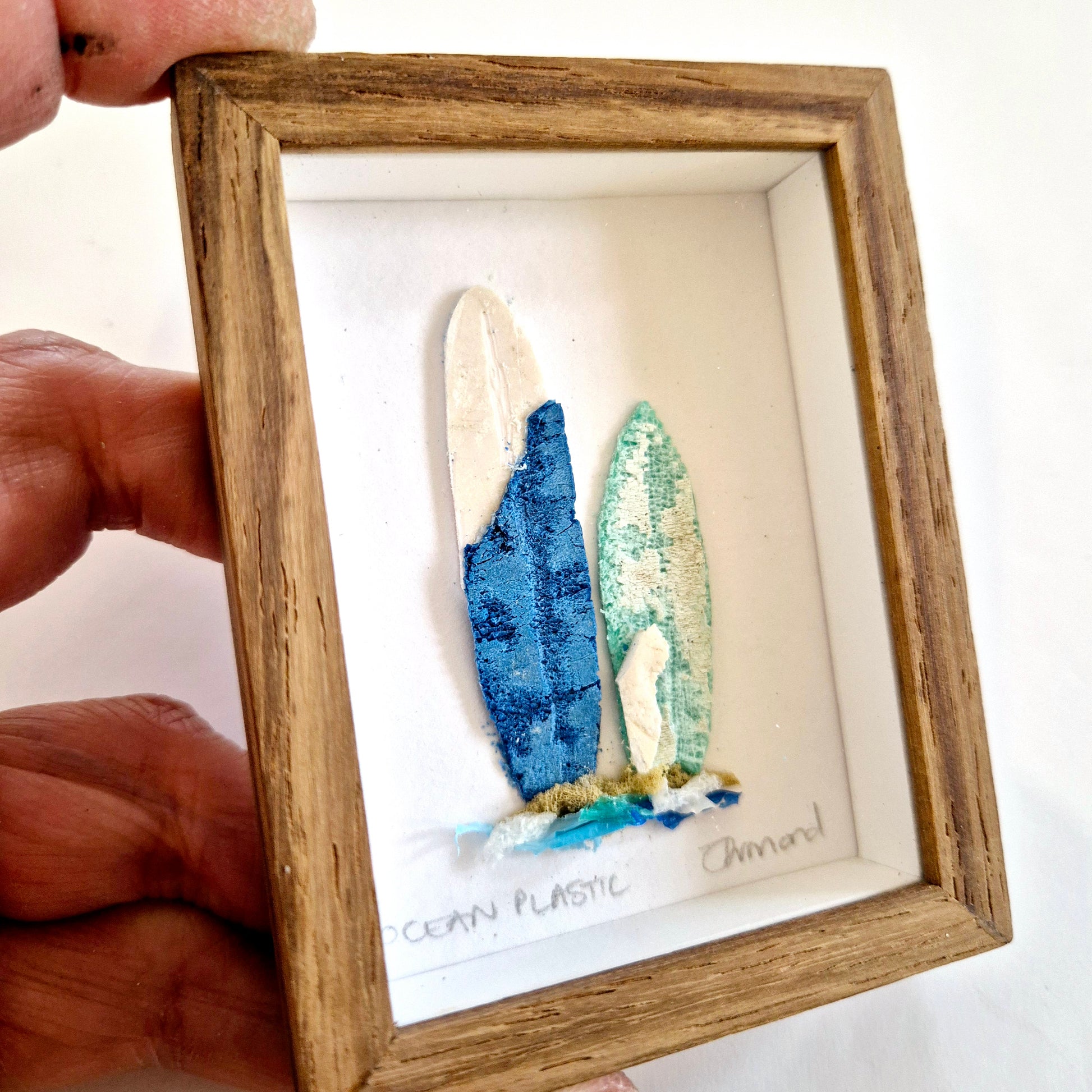 Framed Wall Art made from upcycled ocean plastic pollution by Janet Ormond Surf art