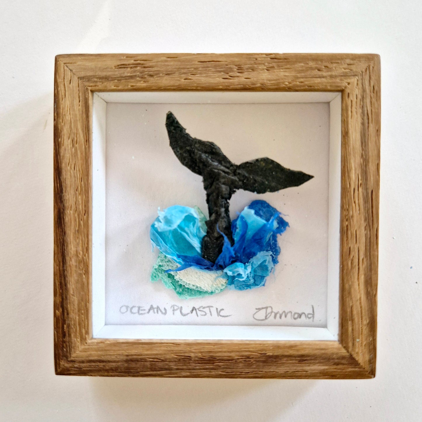 Framed Wall Art made from upcycled ocean plastic pollution by Janet Ormond Whale Art