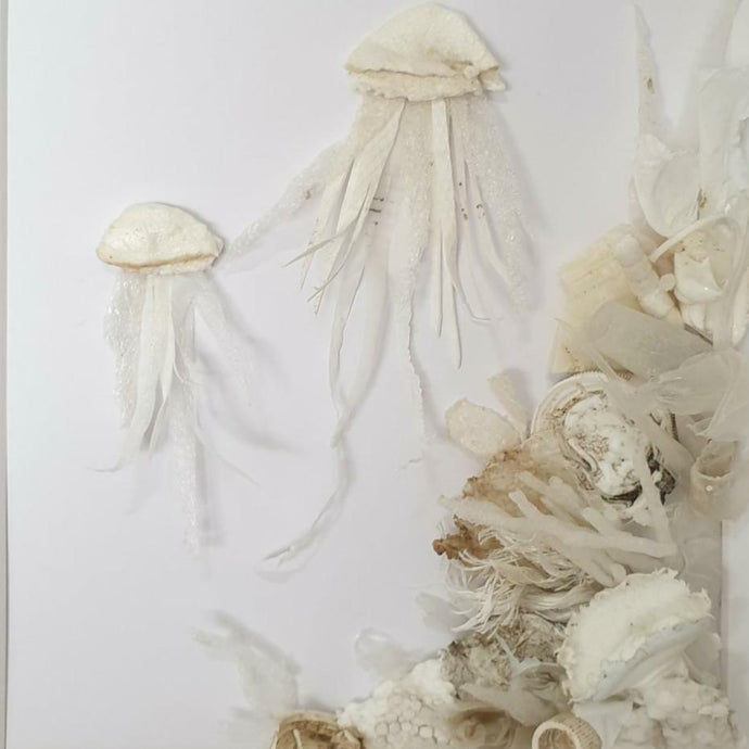 Two white Jellyfish under the sea
